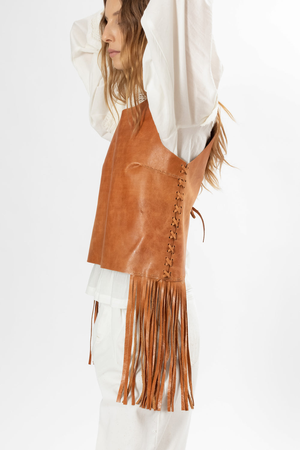 Caramel Leather top with fringes. Hand Matters.