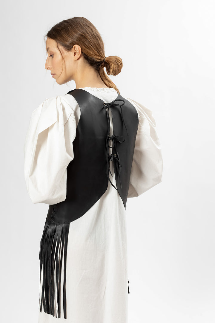 Hand Matters. Black leather top with fringes
